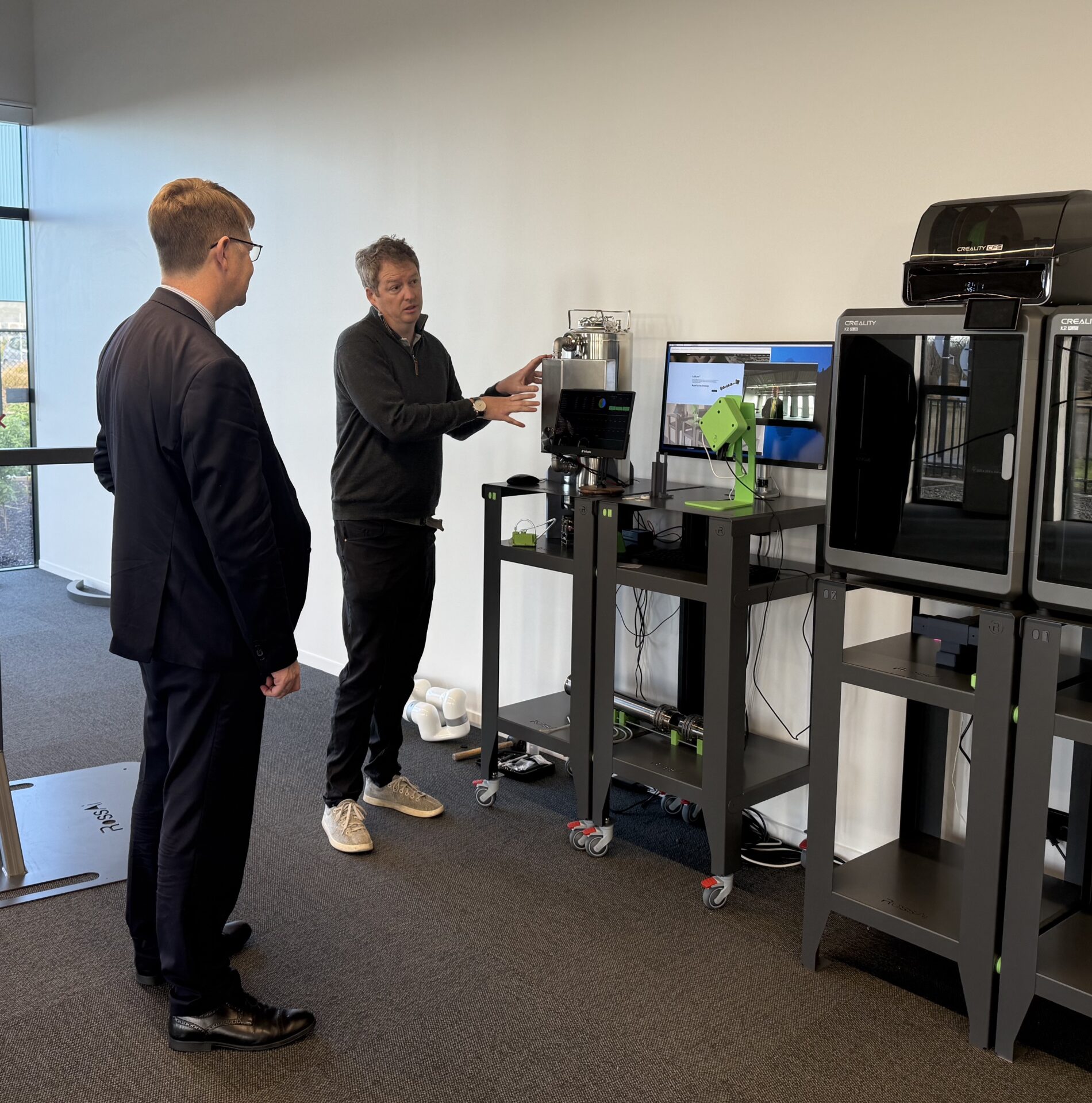 Callum Ross, RossAi, describing his new Ai products to His Excellency Laurence Meredith 